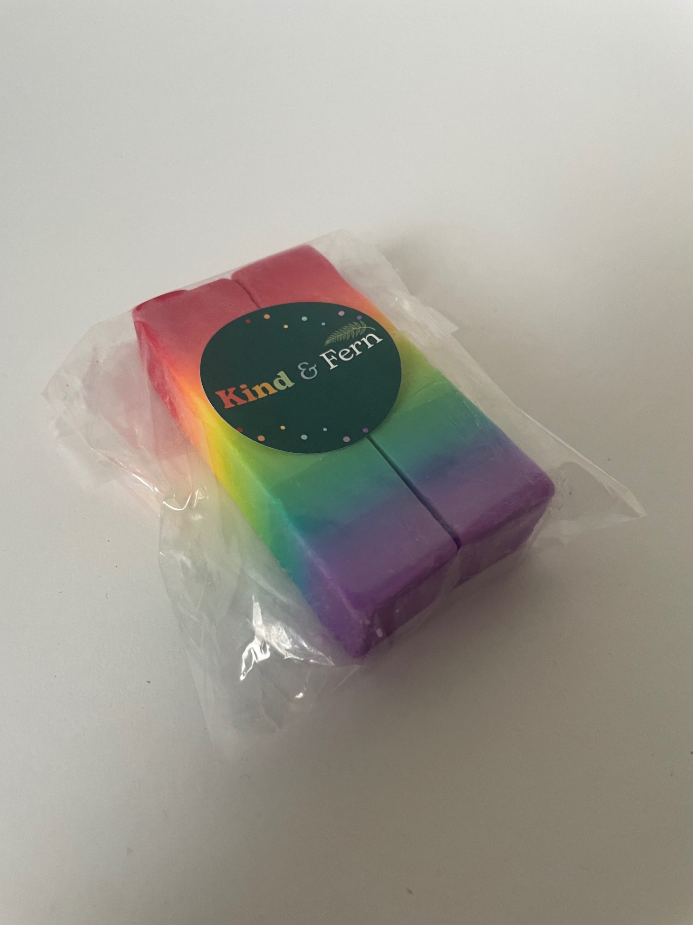 Kind & Fern rainbow layered kids' soap bar in compostable packaging