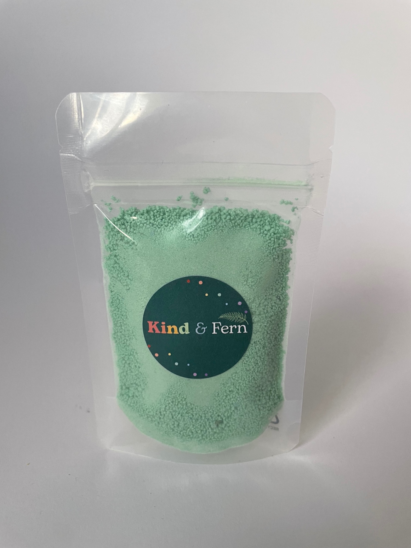 Pouch of Kind & Fern green rainbow bath dust