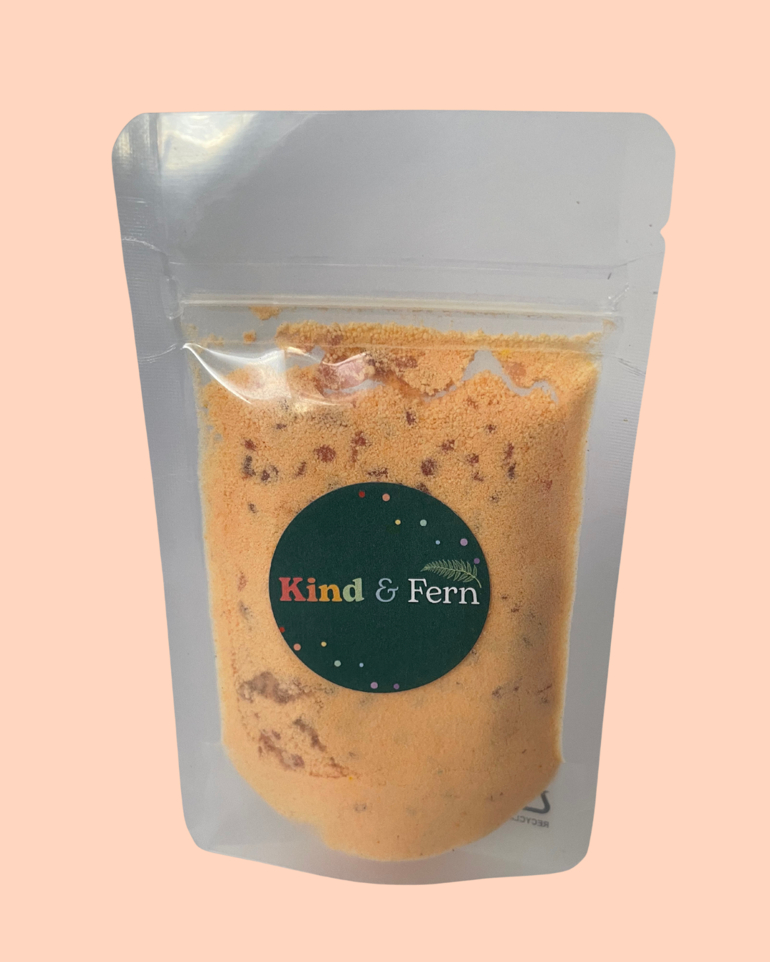 Pouch of Kind & Fern orange rainbow bath dust