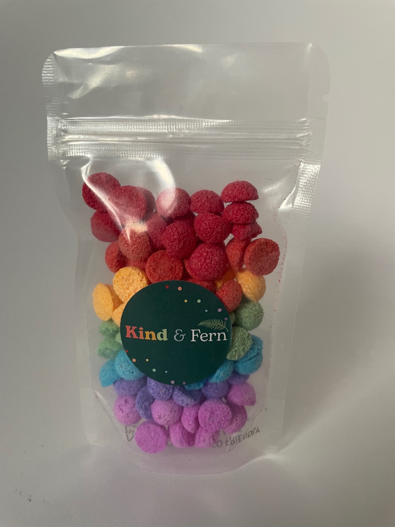 Pouch of Kind & Fern rainbow bath teenies in red, orange, green, blue and purple