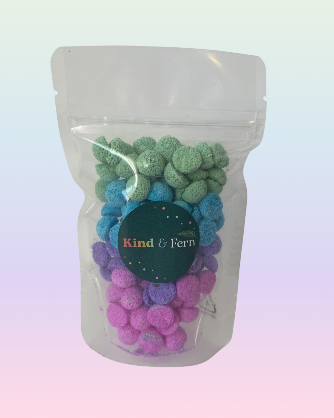 Pouch of Kind & Fern wild berries bath teenies in green, blue, purple and pink